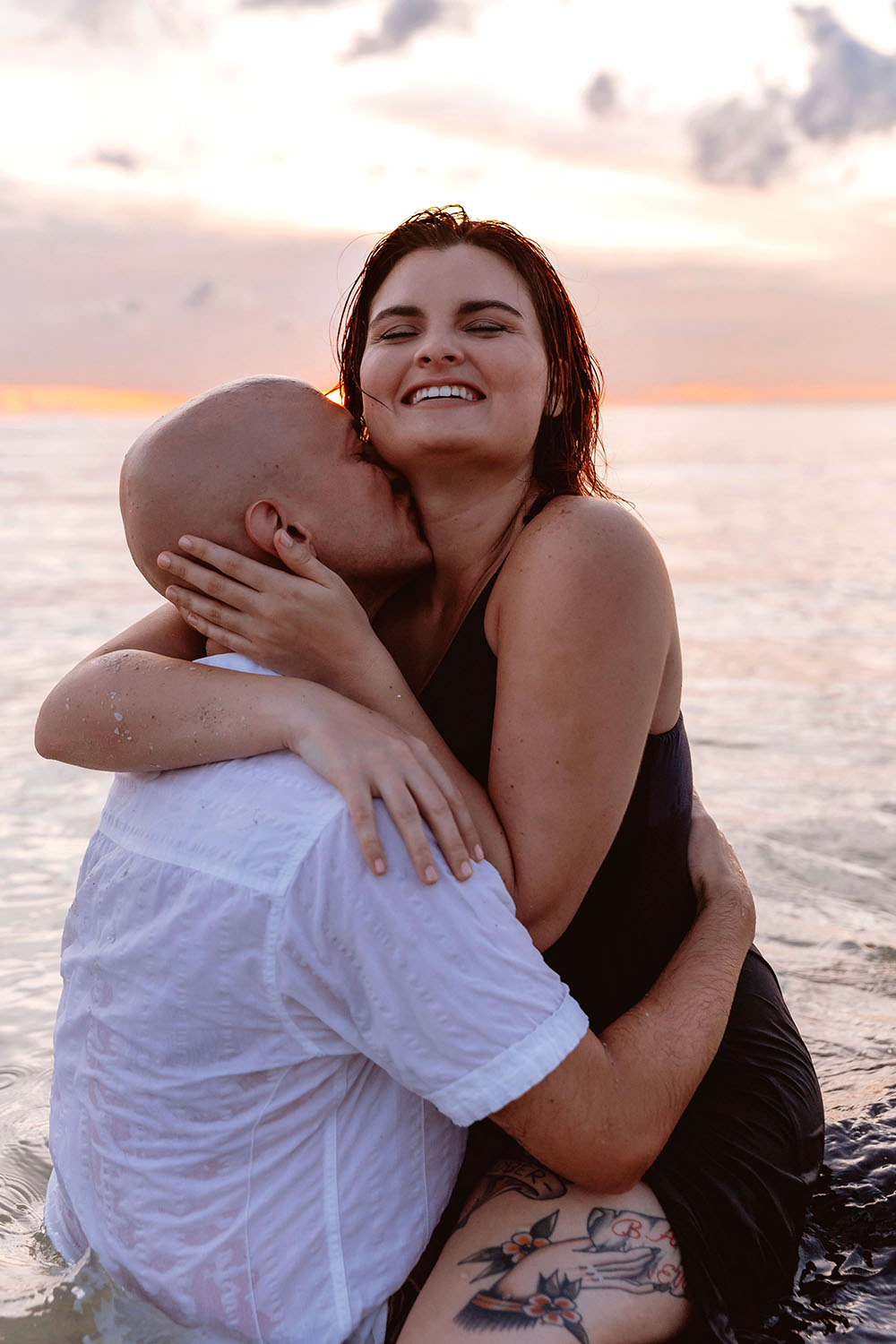 Naples Couples Photographer, man kissing woman's neck
