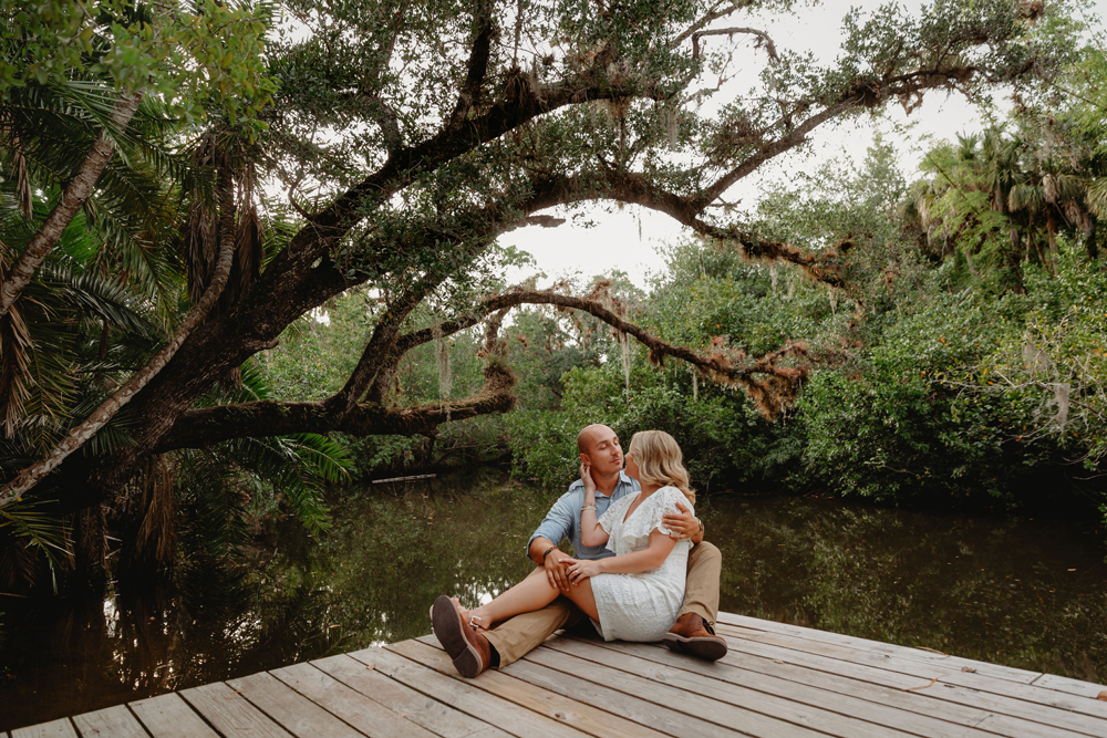 Naples Couples Photographer, sitting on a dock