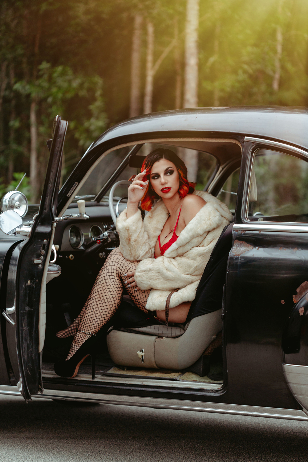 Naples Boudoir Photographer, woman in red lingerie posing in old car