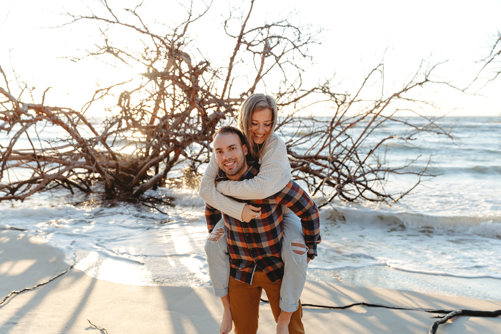 Naples Couples Photographer, piggyback ride on beach
