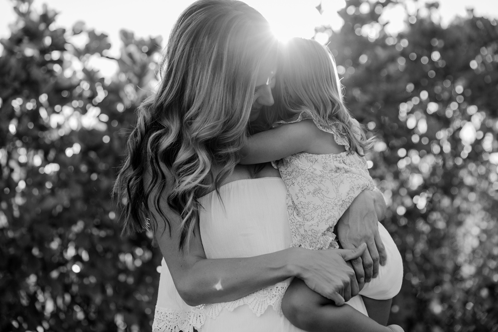 Naples Family Photographer, mother holding daughter